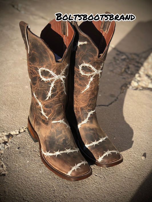 Barbed wire bow by Boltsbootsbrand